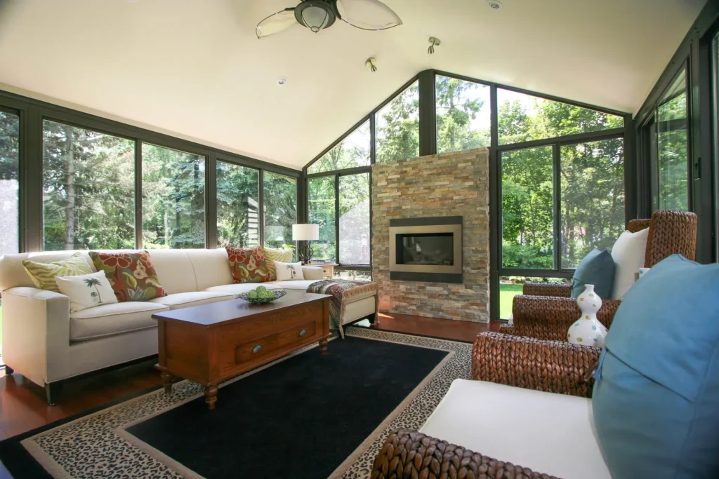 a living room with a fireplace and a couch